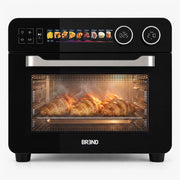 Zwarte BREND Combi Airfryer Oven met croissants achter de glazen deur, vooraanzicht