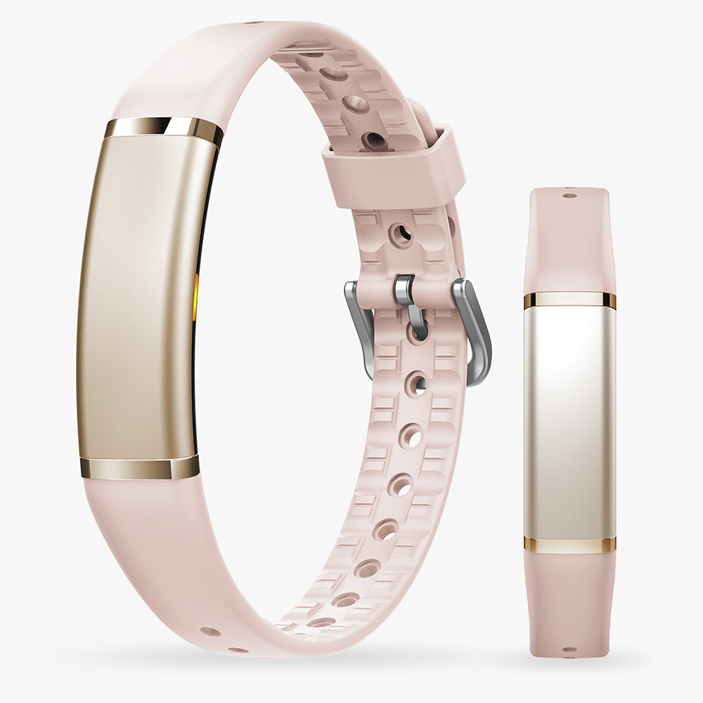 Roze activity tracker met goudkleurige behuizing, naast een los roze bandje